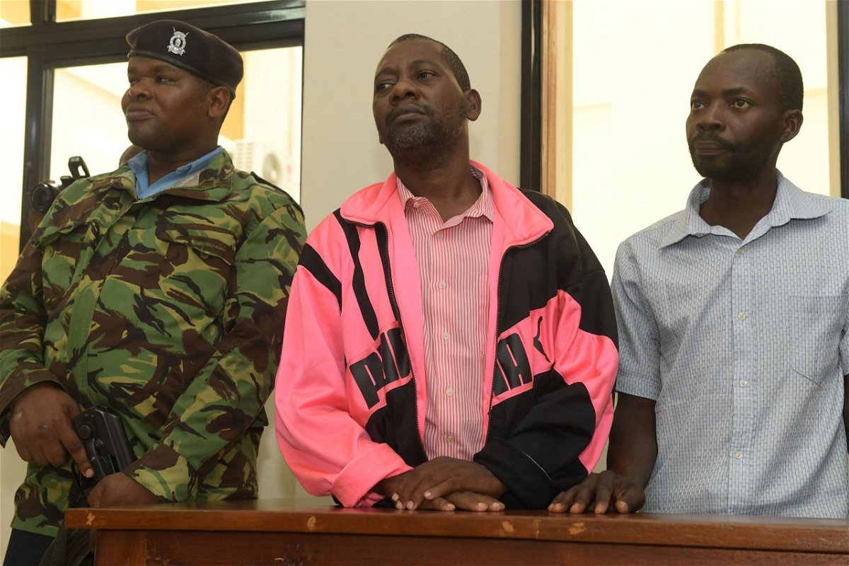 <i>Simon Maina/AFP via Getty Images</i><br/>Self-proclaimed pastor Paul Nthenge Mackenzie (center) is pictured here in court on May 2.