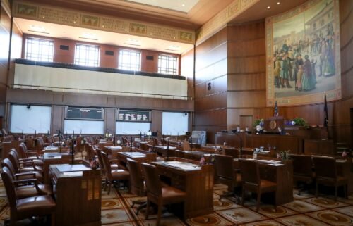 Empty chairs are shown in the Senate chambers prior to a legislative session at the Oregon State Capitol in Salem