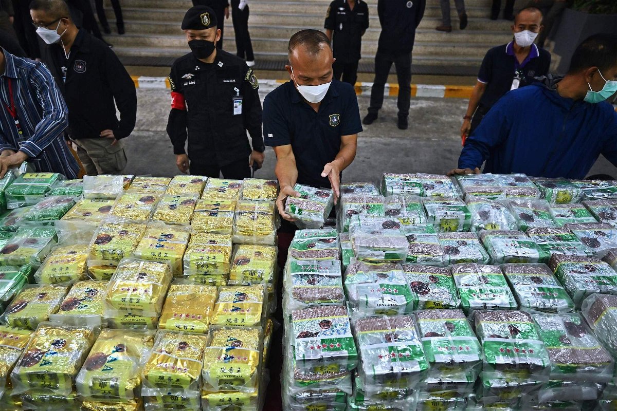 <i>Lillian Suwanrumpha/AFP/Getty Images/FILE</i><br/>Thai police display packages of seized crystal methamphetamine in Bangkok on January 24.