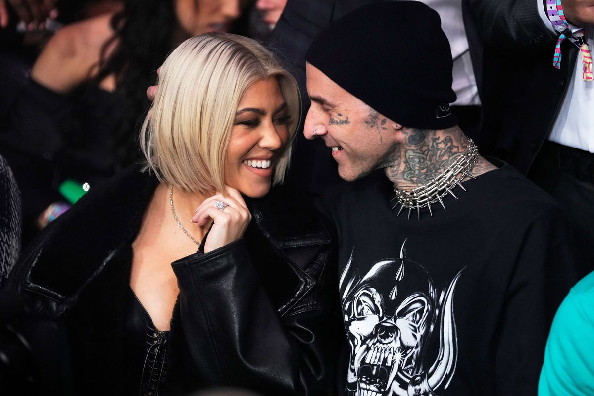 <i>Jeff Bottari/Zuffa LLC/Getty Images</i><br/>Kourtney Kardashian and Travis Barker