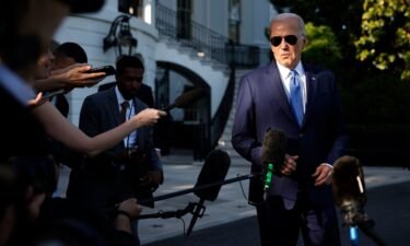 President Joe Biden talks to reporters as he departs the White House for the Memorial Day holiday weekend on May 26 in Washington