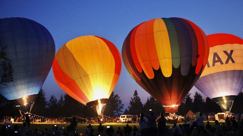 Colorful balloons light up the sky at Balloons Over Bend Nightglow Friday night at the COCC track