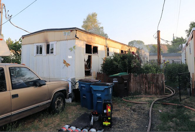 Fire heavily damaged mobile home in NW Prineville while residents were away; 3 pets died