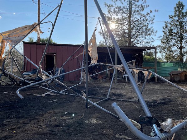Winds caused damage and sparked a fire in Tumalo Saturday evening