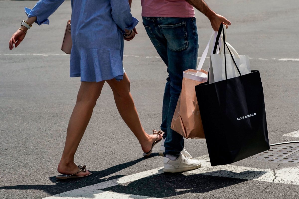 <i>Nathan Howard/Bloomberg/Getty Images</i><br/>Pictured are shoppers in the Georgetown neighborhood of Washington