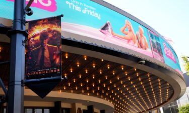 Advertisements for the films "Oppenheimer" and "Barbie" appear at AMC Theaters at The Grove