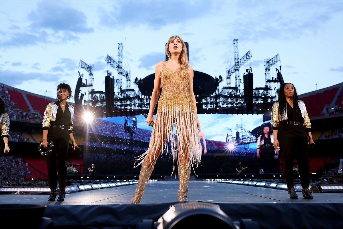 <i>John Shearer/TAS23/Getty Images for TAS Rights Management</i><br/>Taylor Swift performs onstage at GEHA Field at Arrowhead Stadium on July 07