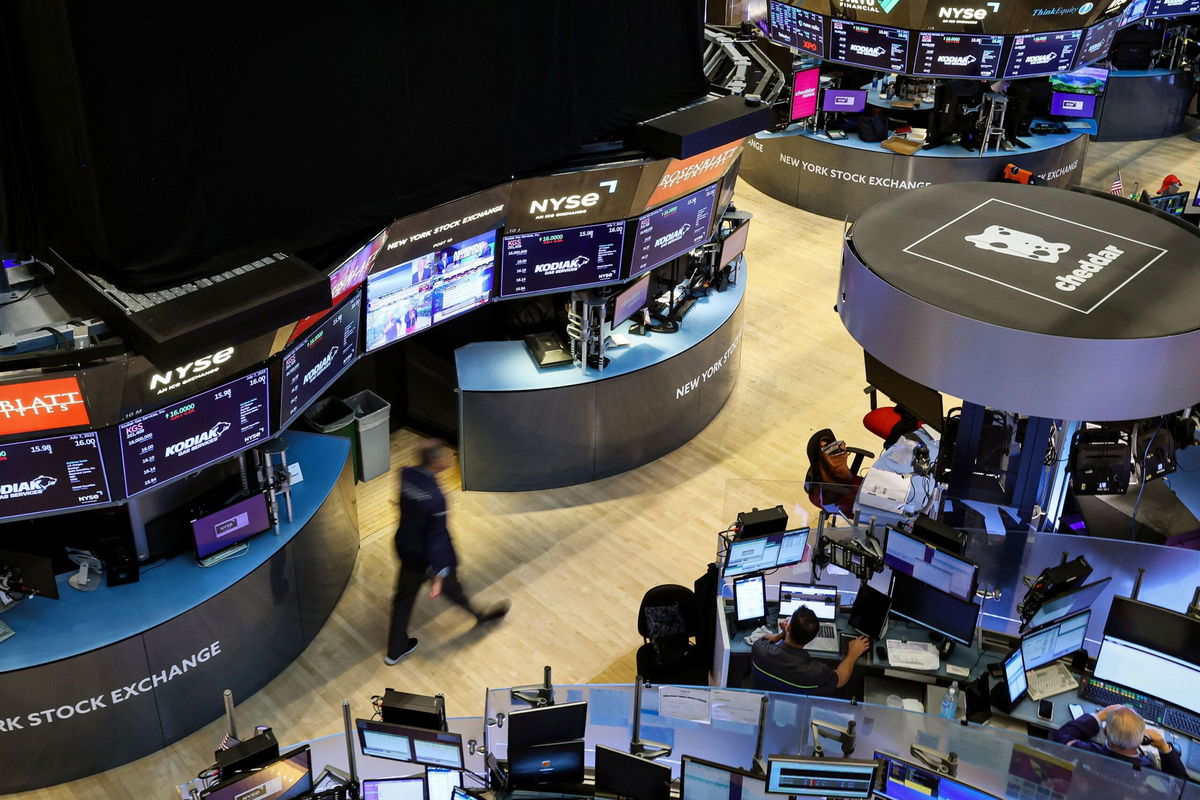 <i>Brendan McDermid/Reuters</i><br/>Traders work on the floor of the New York Stock Exchange on July 7.