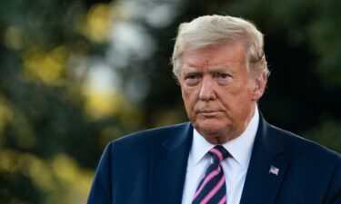 U.S. President Donald Trump exits the Oval Office and walks to Marine One on the South Lawn of the White House on September 22