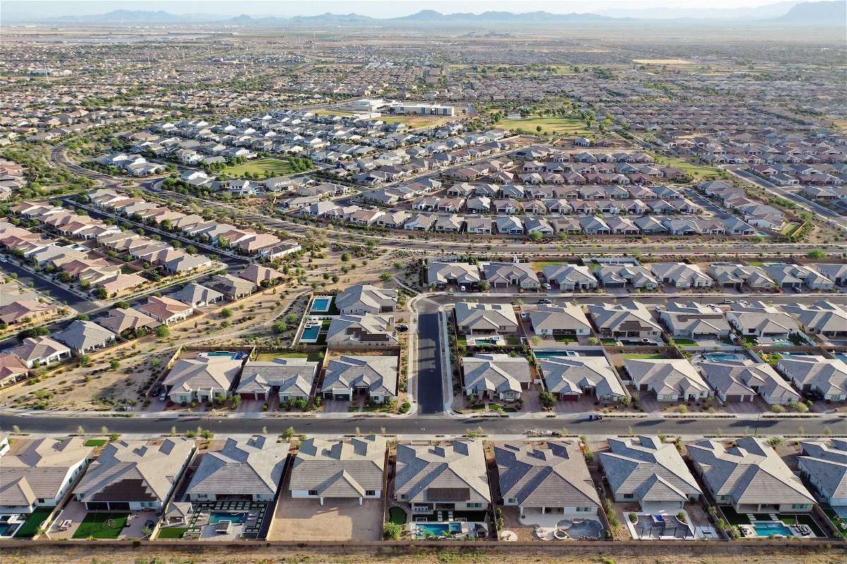 <i>Mario Tama/Getty Images</i><br/>Middle-income Americans think prosperity is within reach. Pictured is an aerial view of homes in the Phoenix suburbs on June 9