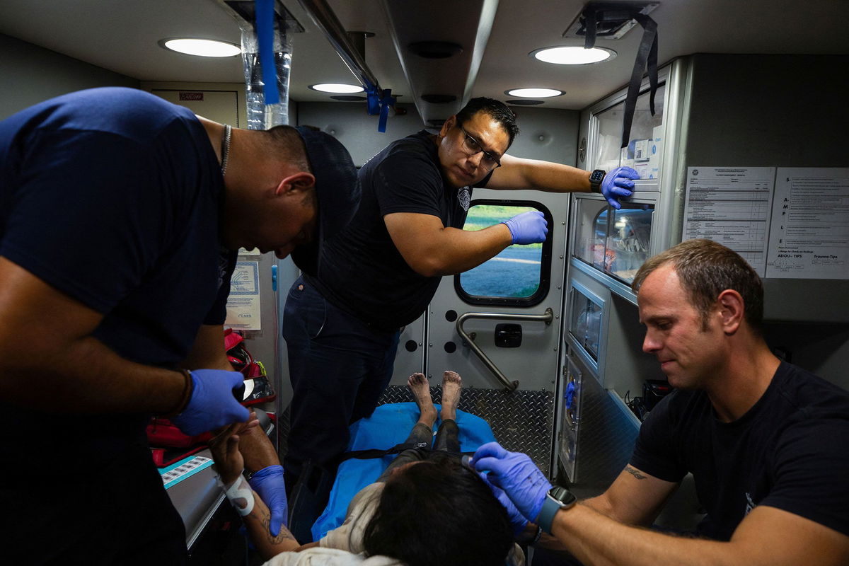 <i>Kaylee Greenlee Beal/Reuters</i><br/>Firefighter EMT Rodrigo Pineda