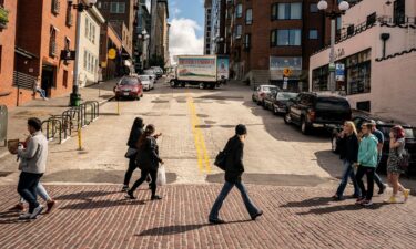 Pedestrians cross the street in Seattle