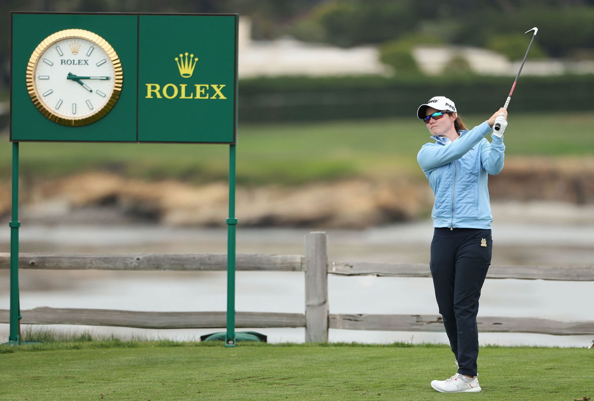 <i>Ezra Shaw/Getty Images</i><br/>Maguire plays her shot from the seventh tee.