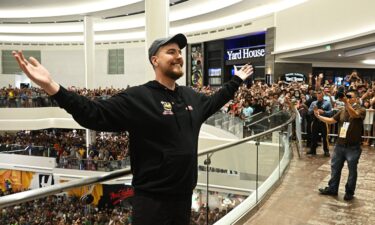 YouTube star MrBeast poses with fans at the launch of the first physical MrBeast Burger restaurant at a mall in East Rutherford