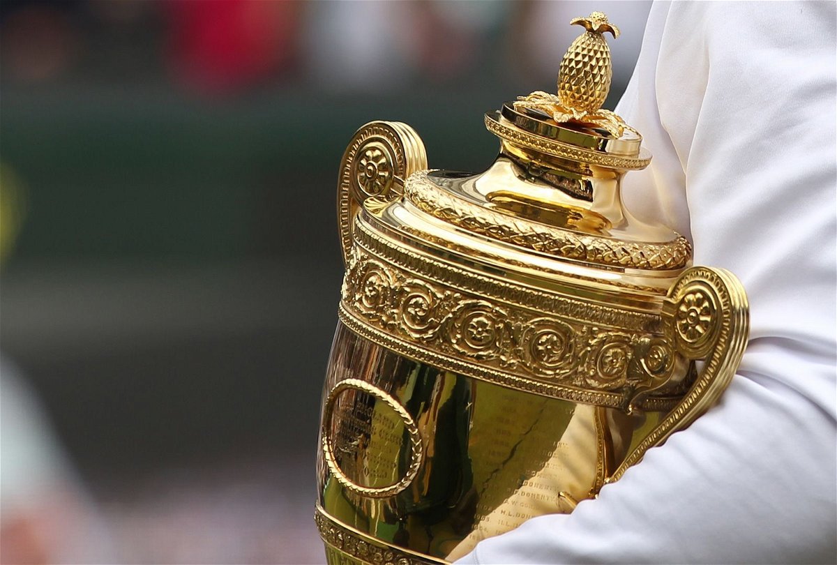 <i>Glyn Kirk/AFP/Getty Images</i><br/>Spanish tennis player Rafael Nadal holds the Wimbledon trophy