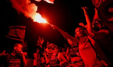 Israelis protest against plans to overhaul the judicial system in Tel Aviv