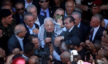 Palestinian President Mahmoud Abbas addresses the crowd during his visit to Jenin Refugee Camp