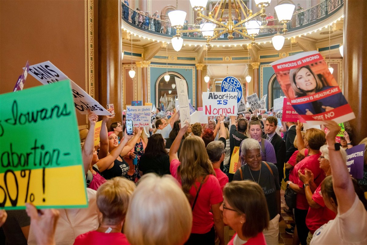 <i>Zach Boyden-Holmes/The Des Moines Register/AP</i><br/>Protestors fill the Iowa State Capitol rotunda