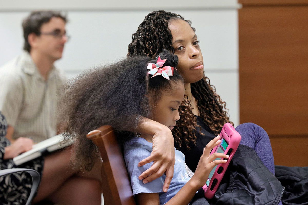 <i>Mike Stocker/South Florida Sun Sentinel/TNS/Getty Images/FILE</i><br/>Philana Holmes and her daughter Olivia Caraballo