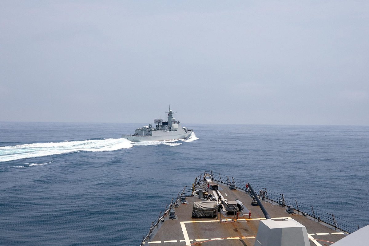<i>U.S. Navy/Reuters</i><br/>The Chinese warship Luyang III sails near the American destroyer USS Chung-Hoon