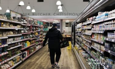 A shopper seen walking between the aisles at a supermarket in Kendal