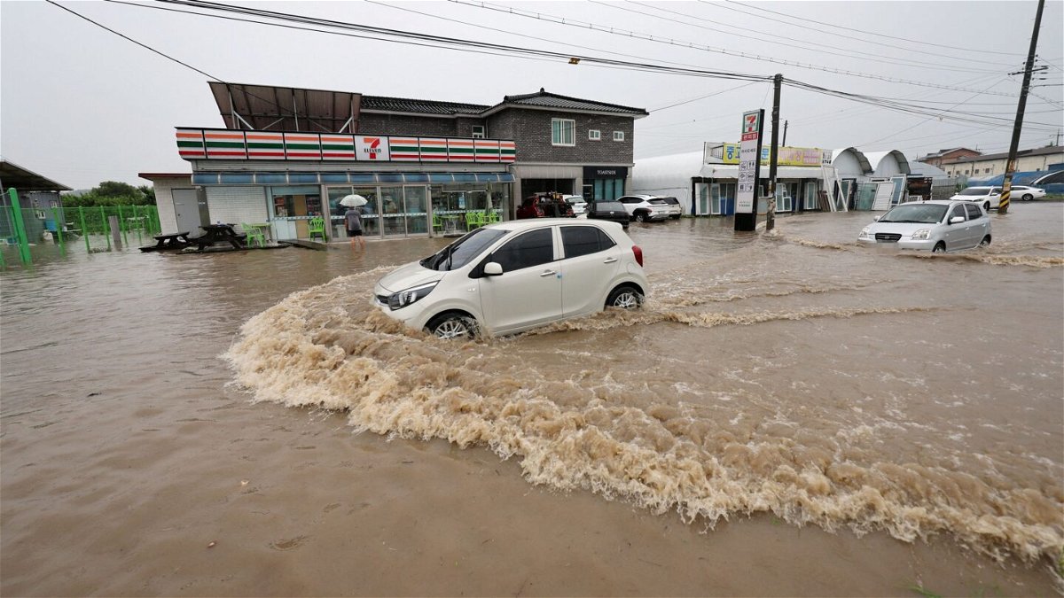 <i>Yonhap/Reuters</i><br/>More than 20 dead and thousands evacuate homes in South Korea due to heavy rain