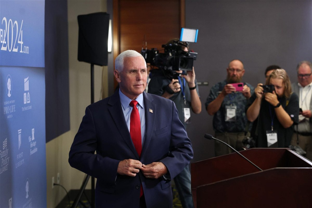<i>Scott Olson/Getty Images</i><br/>Republican presidential candidate Mike Pence speaks to the press after addressing guests at the Family Leadership Summit in Des Moines