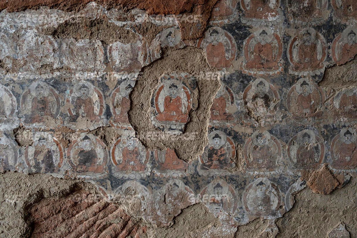 <i>Zhangye Cultural Heritage Administration/Greenpeace</i><br/>Crumbling and detachment on a mural in the Eastern Cave of the Jinta Temple.