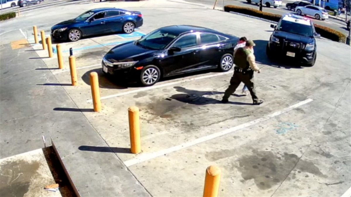 <i>Courtesy of Thomas Beck</i><br/>Footage provided by Emmett Brock's attorney shows Brock being thrown to the ground by the deputy seconds after exiting his car at a convenience store in Whittier.