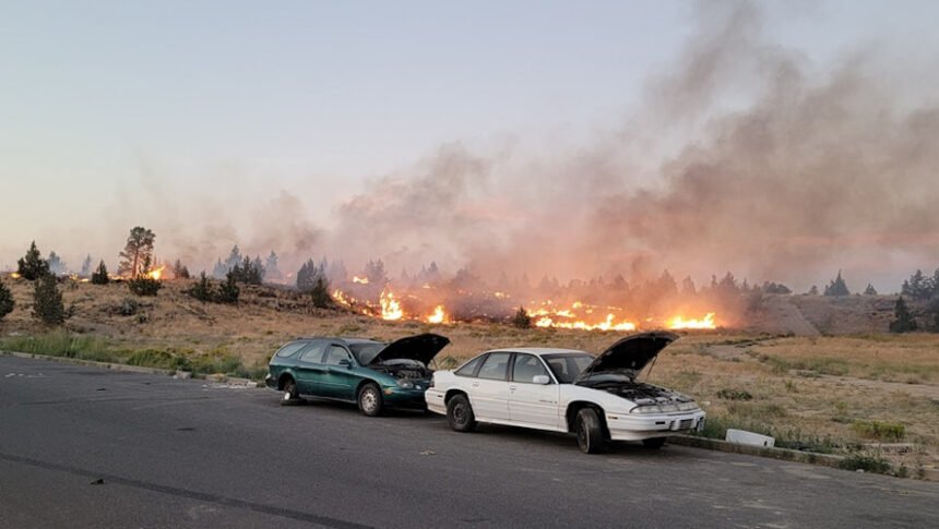 Brush fire just east of Redmond spread quickly Tuesday night