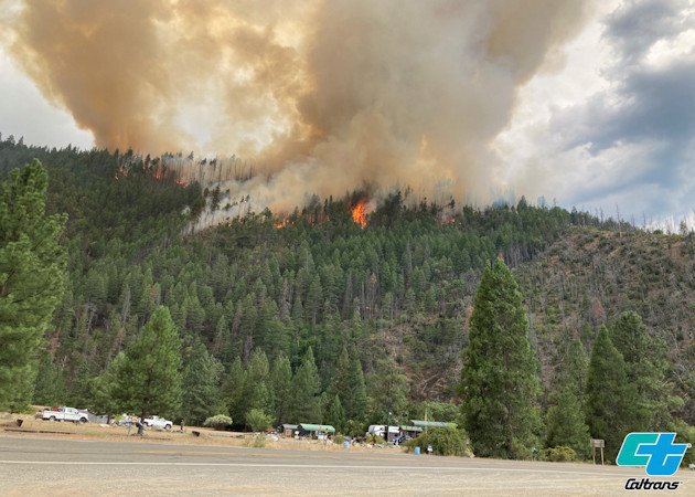 smoke rises from the Head Fire in Klamath National Forest, Calif., on Tuesday