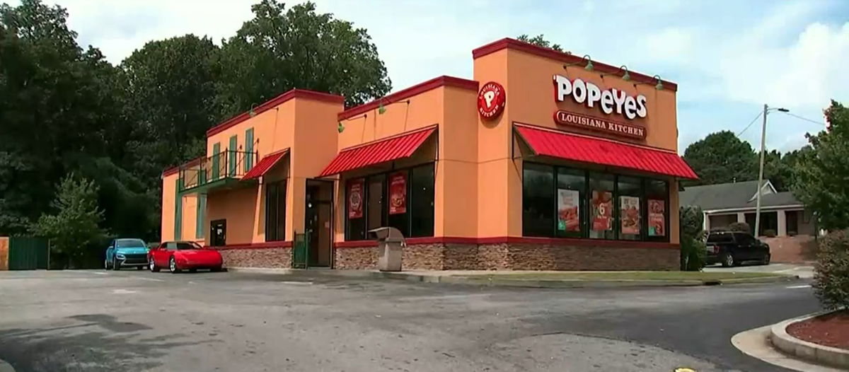 <i></i><br/>A woman is suing Popeyes following an alleged drive-thru assault at an Atlanta location.