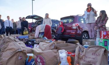 Jennifer Hua addresses a group of volunteers in Midvale on Dec. 5