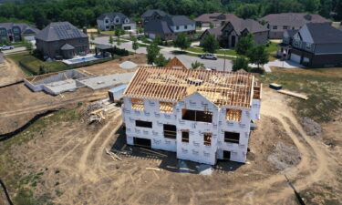 New home sales rose to a 17-month high in July. Pictured is a home under construction at a housing development in Illinois.