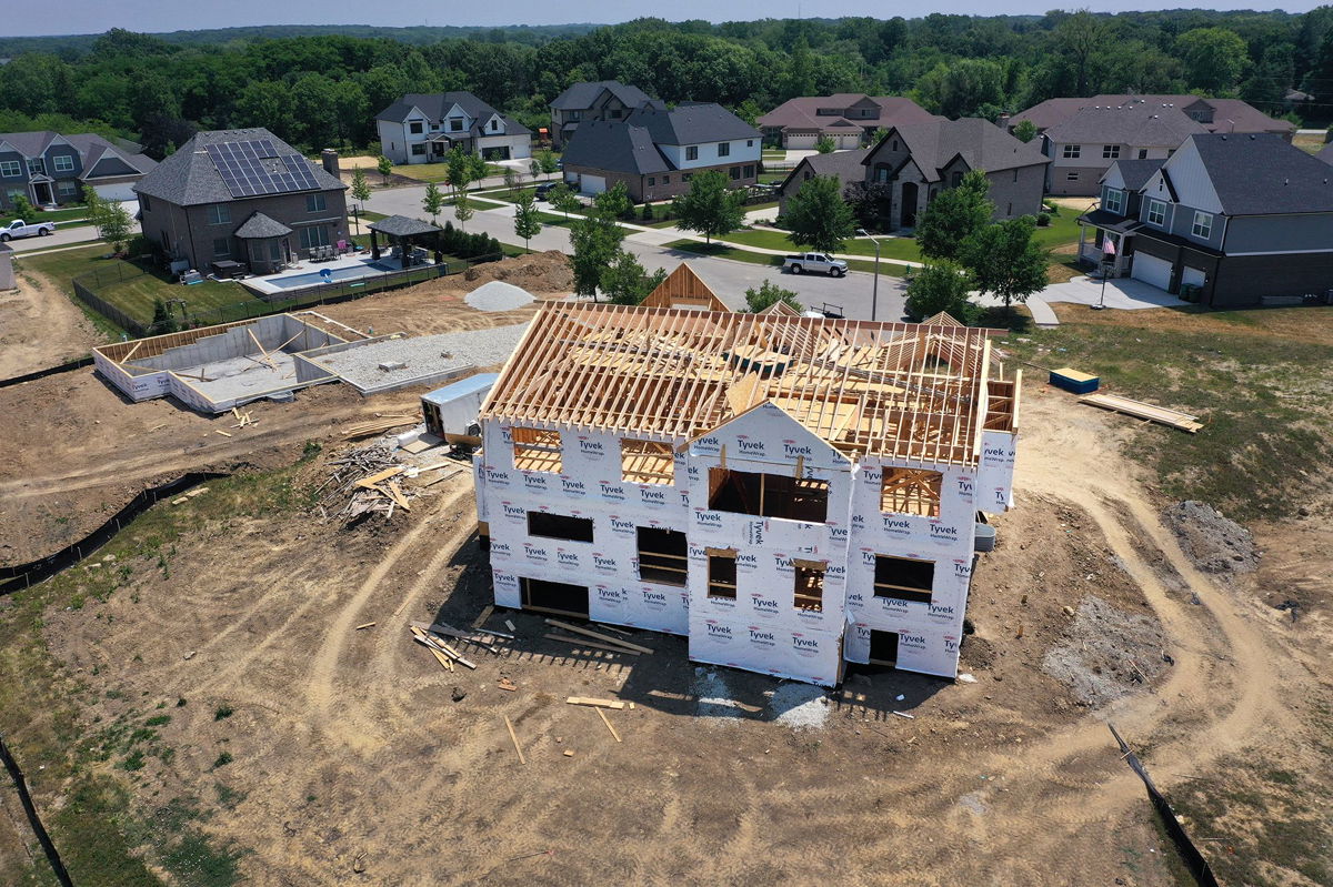 <i>Scott Olson/Getty Images</i><br/>New home sales rose to a 17-month high in July. Pictured is a home under construction at a housing development in Illinois.