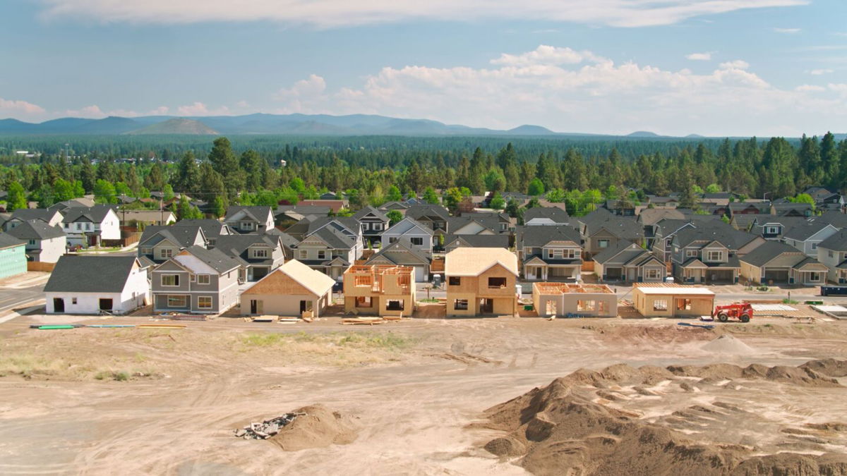 <i>halbergman/E+/Getty Images</i><br/>Aerial establishing shot of suburban homes being built over farmland in southeast Bend