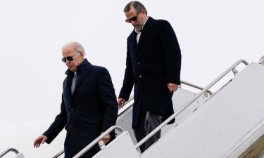President Joe Biden (left) and son Hunter Biden disembark from Air Force One at Hancock Field Air National Guard Base in Syracuse