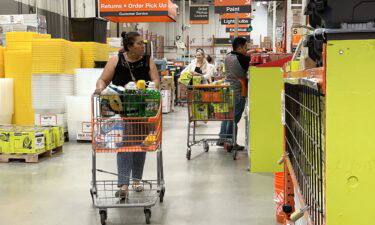 Customers shop at a Home Depot store on July 25 in San Rafael