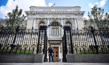 A police officer guards the entrance of the Russian Central Bank headquarters in downtown Moscow on July 21.