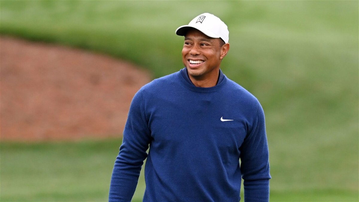 <i>Ross Kinnaird/Getty Images</i><br/>Tiger Woods warms up on the practice area prior to the 2023 Masters Tournament at Augusta National Golf Club on April 3 in Augusta