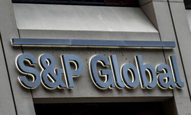 The S&P Global logo is displayed on its offices in the financial district in New York City on December 13