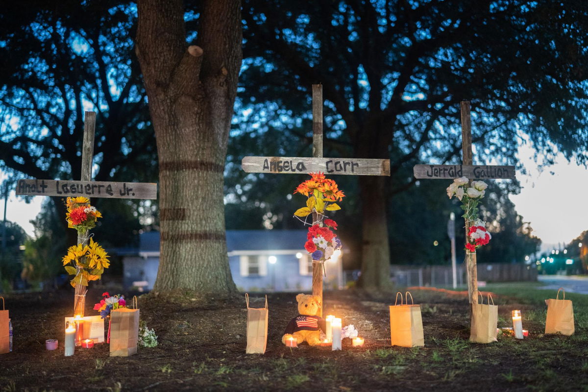 <i>Sean Rayford/Getty Images</i><br/>Mourners set up memorials for Angela Carr