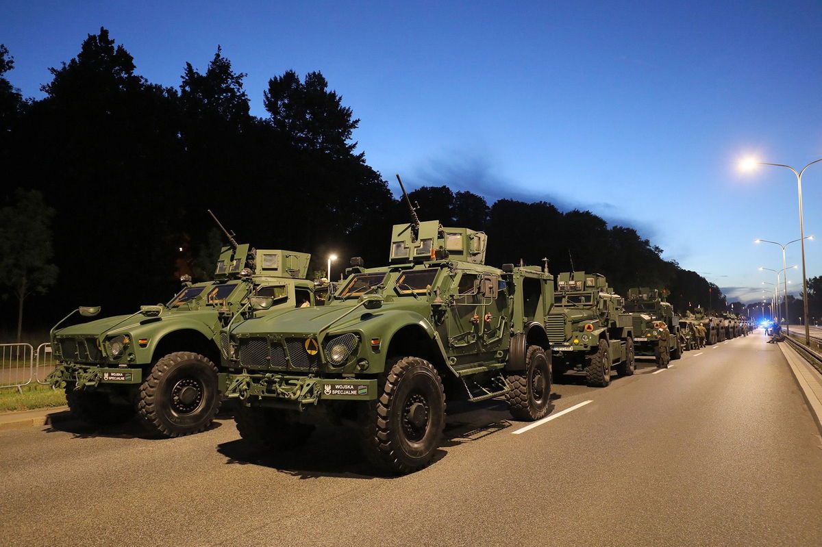 <i>Pawel Supernak/EPA-EFE/Shutterstock</i><br/>Polish military vehicles are seen during a Saturday rehearsal for this week's parade in Warsaw.