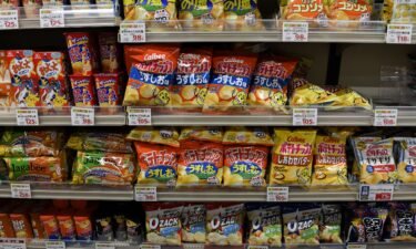 Bags of Calbee chips are pictured at a supermarket in Tokyo in July 2021.