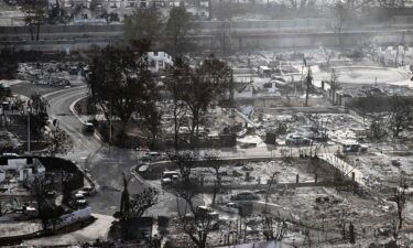 An aerial image taken shows destroyed homes and buildings burned to the ground in Lahaina in the aftermath of wildfires in western Maui