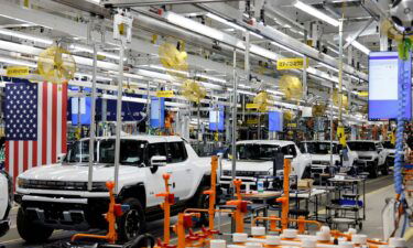 Hummer EV are seen on the production line as President Joe Biden tours the General Motors plant