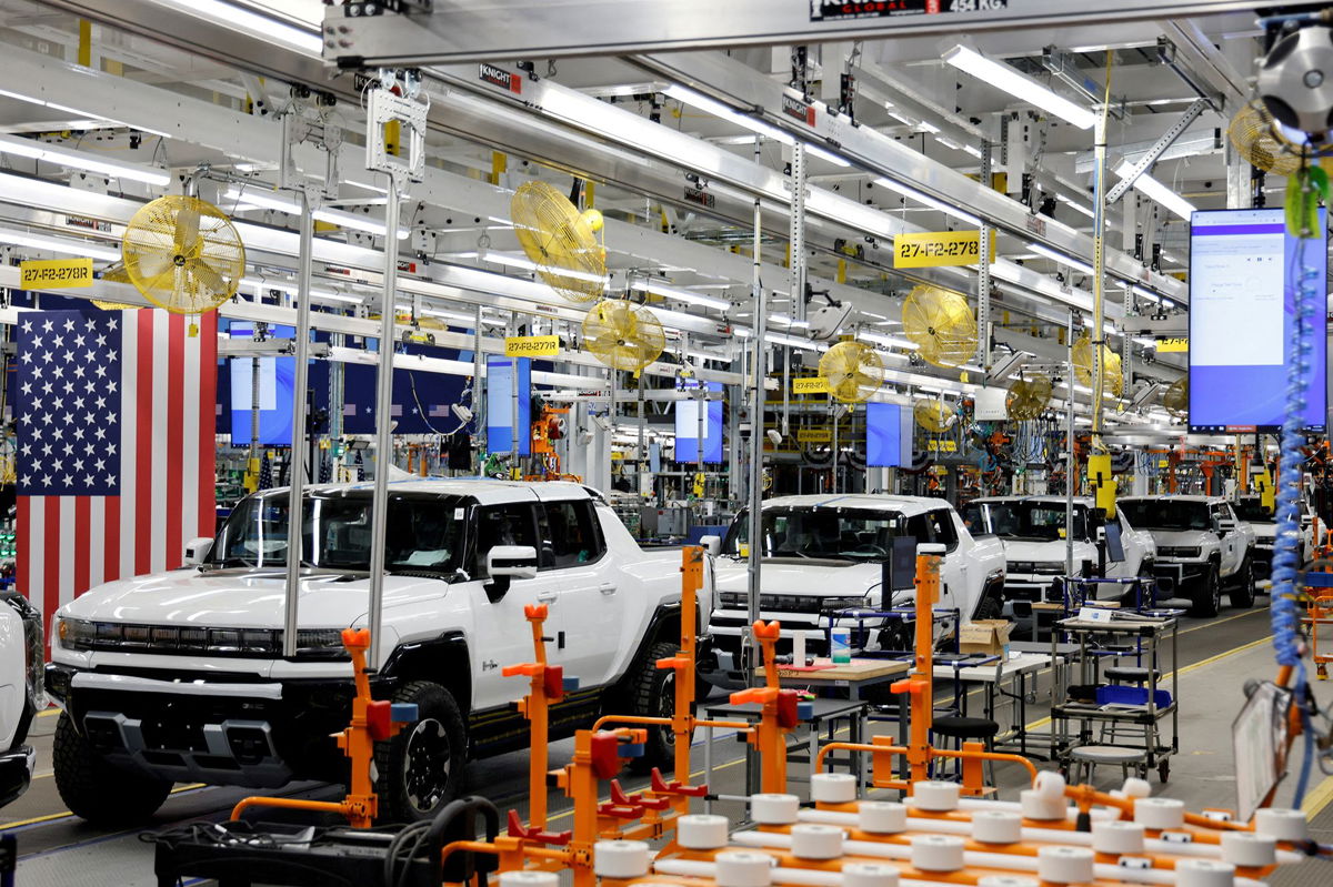 <i>Jonathan Ernst/Reuters/FILE</i><br/>Hummer EV are seen on the production line as President Joe Biden tours the General Motors plant