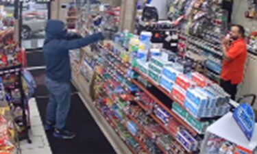 Surveillance video shows Christian Luis Velez-Ruiz brandishing a handgun during a September 2021 gas station robbery in Southington