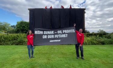 Greenpeace activists hung a black cloth over British Prime Minister Rishi Sunak's private mansion in northern England on Thursday