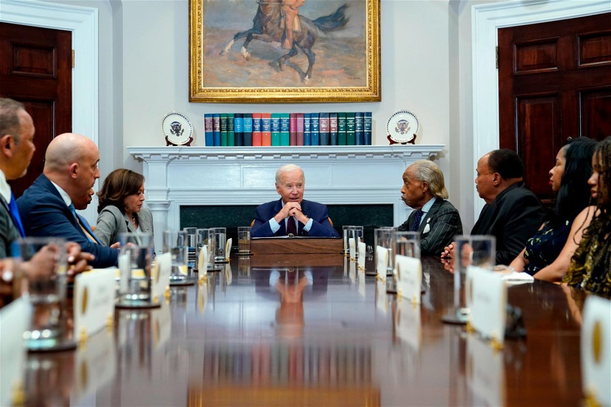 <i>Susan Walsh/AP</i><br/>President Joe Biden speaks as he and Vice President Kamala Harris meet with organizers of the 60th anniversary of the March on Washington in the Roosevelt Room of the White House in Washington on Aug. 28.